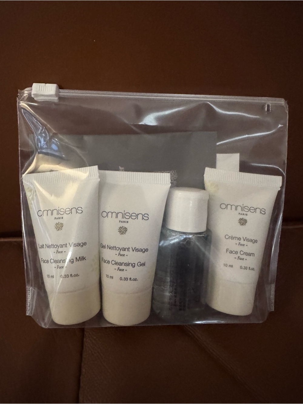 Omnisens Paris 4-Piece Travel Skincare Set + Pouch (New)